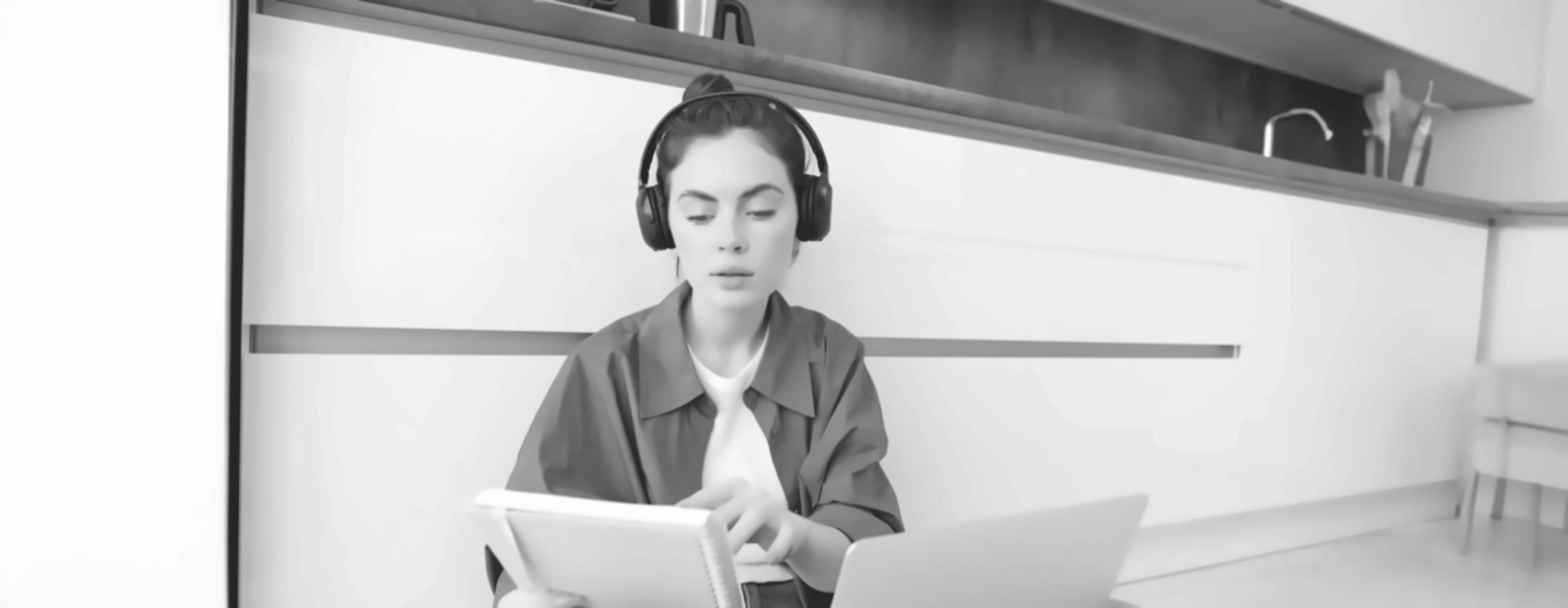 Person reviewing financial reports with clear budget categories