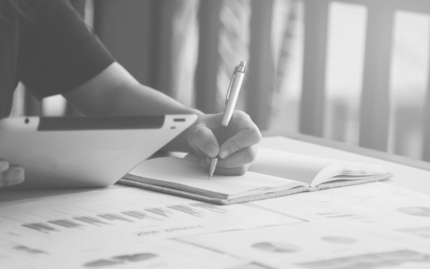 Student reviewing budget materials during program session