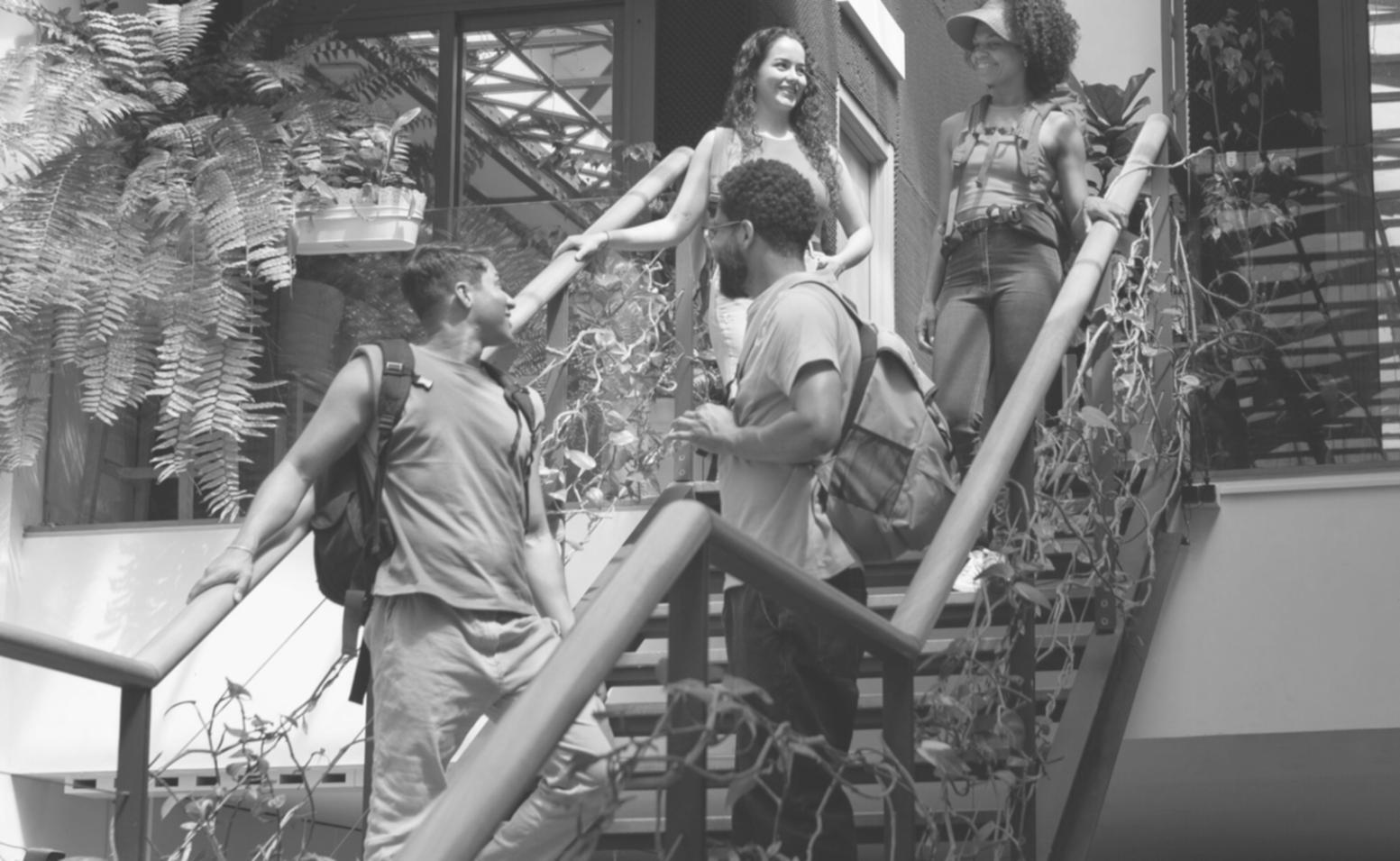 Budget planning session with multiple participants reviewing financial documents